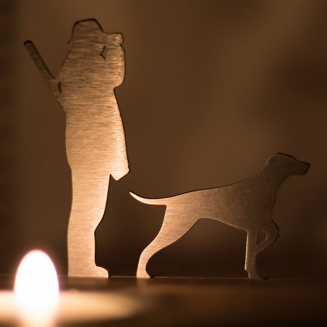 Unoferrum Silhouette Winterlandschaft L Jäger und Hund